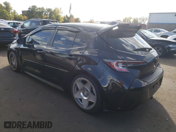 2022 Toyota Corolla Hatchback SE with VIN JTND4MBEXN3180370, listed as a Copart auction lot 74436644 with 57,563 mi miles and Salvage Title. Bid and sale history available at carsss.com. Image 2.