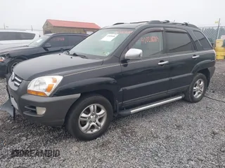 2008 Kia Sportage LX with VIN KNDJE723987527110, listed as a IAAI auction lot 42020008 with 197,810 mi miles and . Bid and sale history available at DreamBid. Image 18.