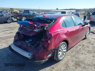 2019 Toyota Camry LE with VIN 4T1B11HK1KU233345, listed as a IAAI auction lot 41971136 with 51,499 mi miles and . Bid and sale history available at DreamBid. Image 4.