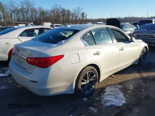 2017 Infiniti Q50 Premium with VIN JN1EV7AR1HM838526, listed as a IAAI auction lot 41249632 with 67,171 mi miles and . Bid and sale history available at DreamBid. Image 4.