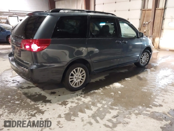 2009 Toyota Sienna XLE with VIN 5TDBK22C29S028110, listed as a IAAI auction lot 41496169 with 253,057 mi miles and . Bid and sale history available at DreamBid. Image 4.