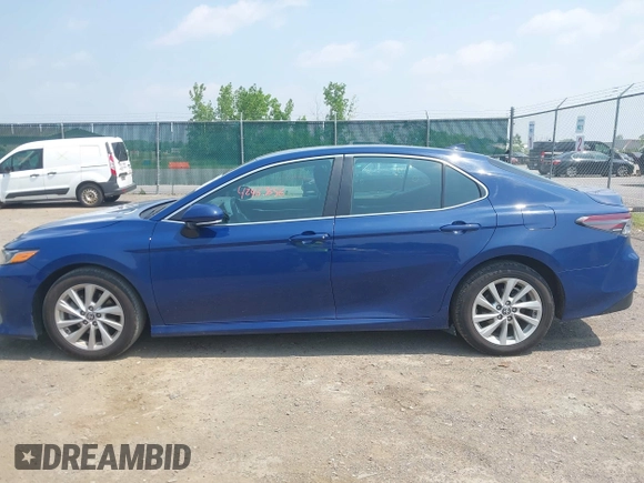 2023 Toyota Camry LE z VIN 4T1R11AK9PU180068, wystawiony jako IAAI lot #42483656 z przebiegiem 59 312 mil mil oraz . Historia ofert i sprzedaży dostępna na DreamBid. Obrazek 14.