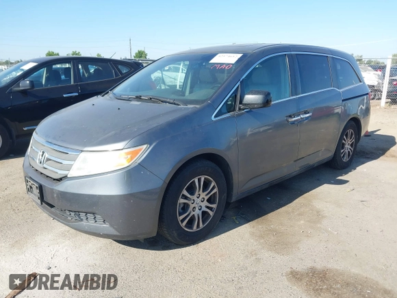 2012 Honda Odyssey EX-L with VIN 5FNRL5H6XCB061026, listed as a IAAI auction lot 42574612 with 144,480 mi miles and . Bid and sale history available at DreamBid. Image 17.