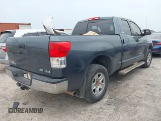 2010 Toyota Tundra z VIN 5TFUW5F10AX137509, wystawiony jako IAAI lot #42061138 z przebiegiem 139 128 mil mil oraz . Historia ofert i sprzedaży dostępna na DreamBid. Obrazek 4.