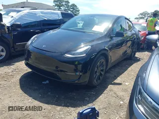 2022 Tesla Model Y Long Range z VIN 7SAYGDEE4NA006645, wystawiony jako IAAI lot #42192495 z przebiegiem 28 784 mil mil oraz . Historia ofert i sprzedaży dostępna na DreamBid. Obrazek 2.