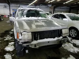 1997 Jeep Grand Cherokee Limited with VIN 1J4GZ78Y1VC706353, listed as a Copart auction lot 41437085 with 163,675 mi miles and Salvage Title. Bid and sale history available at carsss.com. Image 10.