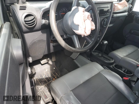 2009 Jeep Wrangler X z VIN 1J4FA24169L706787, wystawiony jako Copart lot #51540265 z przebiegiem 126 934 mil mil oraz Szkoda całkowita • Salvage title. Historia ofert i sprzedaży dostępna na DreamBid. Obrazek 8.