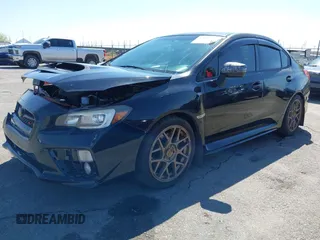2015 Subaru WRX Limited with VIN JF1VA1G67F8809515, listed as a IAAI auction lot 42003173 with 112,414 mi miles. Bid and sale history available at carsss.com. Image 2.