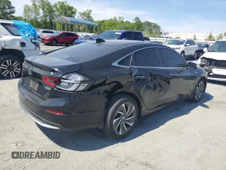 2019 Honda Insight Touring z VIN 19XZE4F97KE019841, wystawiony jako Copart lot #53578335 z przebiegiem 93 672 mil mil oraz Szkoda całkowita • Salvage title. Historia ofert i sprzedaży dostępna na DreamBid. Obrazek 3.