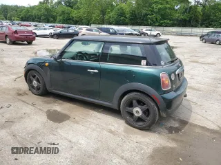 2007 MINI Hardtop with VIN WMWMF33537TL77985, listed as a Copart auction lot 61908635 with 180,470 mi miles and Salvage title. Bid and sale history available at DreamBid. Image 2.