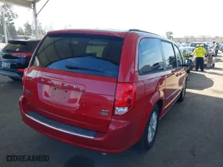 2014 Dodge Grand Caravan SXT 30th Anniversary with VIN 2C4RDGCG9ER429356, listed as a IAAI auction lot 41849654 with 100,843 mi miles. Bid and sale history available at carsss.com. Image 4.