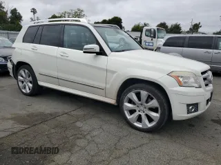 2011 Mercedes-Benz GLK 350 with VIN WDCGG5GB8BF561250, listed as a Copart auction lot 54387585 with 141,182 mi miles and Salvage Title. Bid and sale history available at DreamBid. Image 4.
