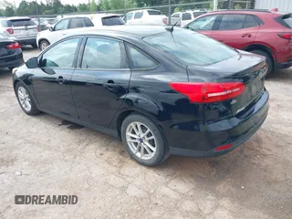 2016 Ford Focus SE z VIN 1FADP3F2XGL312445, wystawiony jako IAAI lot #42288210 z przebiegiem 64 115 mil mil oraz . Historia ofert i sprzedaży dostępna na DreamBid. Obrazek 3.