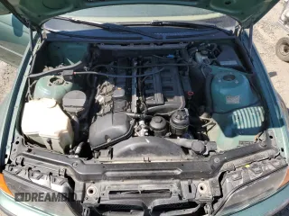 1999 BMW 3 Series 323i with VIN WBAAM3333XFP52697, listed as a Copart auction lot 62747084 with 252,596 mi miles and Salvage Title. Bid and sale history available at carsss.com. Image 11.