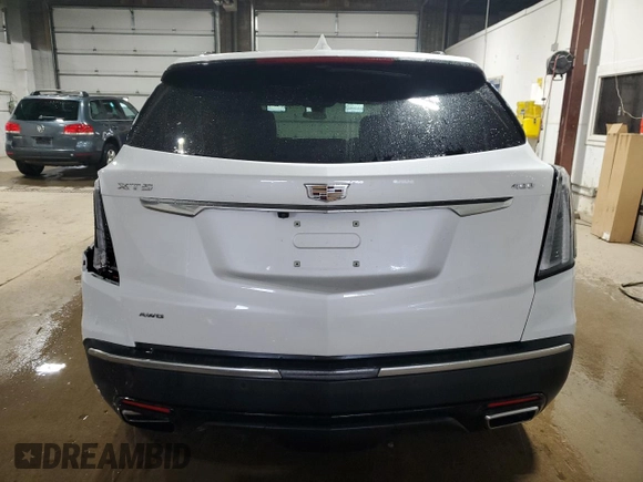 2021 Cadillac XT5 AWD Sport with VIN 1GYKNGRS5MZ142444, listed as a Copart auction lot 54502285 with 27,070 mi miles and Salvage title. Bid and sale history available at DreamBid. Image 6.