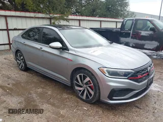 2021 Volkswagen Jetta GLI S with VIN 3VW6T7BU2MM021376, listed as a IAAI auction lot 41448938 with 59,016 mi miles and . Bid and sale history available at DreamBid. Image 1.