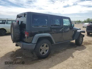 2011 Jeep Wrangler Unlimited Rubicon with VIN 1J4BA6H16BL561658, listed as a Copart auction lot 58379755 with 103,587 mi miles and Salvage title. Bid and sale history available at DreamBid. Image 3.