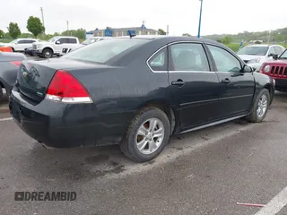 2013 Chevrolet Impala LS with VIN 2G1WF5E32D1149568, listed as a IAAI auction lot 42131854 with 194,934 mi miles and . Bid and sale history available at DreamBid. Image 4.