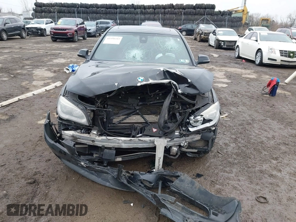 2015 BMW 7 Series 750i xDrive with VIN WBAYB6C59FD965820, listed as a IAAI auction lot 41558215 with 142,617 mi miles. Bid and sale history available at carsss.com. Image 6.