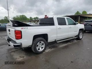 2016 Chevrolet Silverado 1500 LT with VIN 3GCUKREC1GG341223, listed as a Copart auction lot 56547195 with 180,189 mi miles and Salvage Title. Bid and sale history available at DreamBid. Image 3.