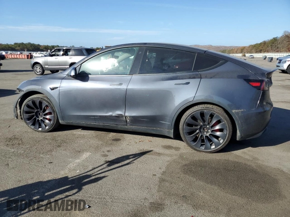 2022 Tesla Model Y Performance z VIN 7SAYGDEF5NF338301, wystawiony jako Copart lot #78189114 z przebiegiem 55 881 mil mil oraz Szkoda całkowita • Salvage title. Historia ofert i sprzedaży dostępna na DreamBid. Obrazek 2.