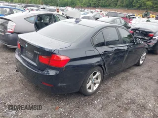2015 BMW 3 Series 328i xDrive with VIN WBA3B3G5XFNR86284, listed as a IAAI auction lot 42480891 with 65,449 mi miles and . Bid and sale history available at DreamBid. Image 4.