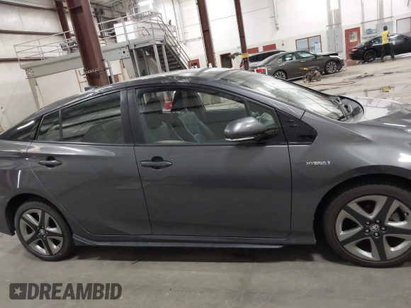 2020 Toyota Prius L Eco with VIN JTDKARFU1L3117299, listed as a IAAI auction lot 42544586 with 42,560 mi miles and . Bid and sale history available at DreamBid. Image 13.