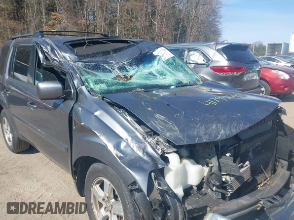 2012 Honda Pilot EX-L with VIN 5FNYF4H75CB045693, listed as a IAAI auction lot 41795689 with 200,686 mi miles and . Bid and sale history available at DreamBid. Image 6.