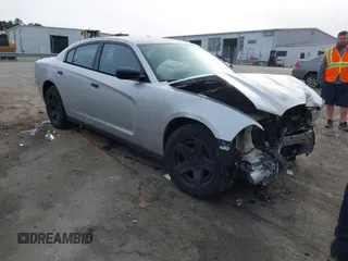 2014 Dodge Charger Police with VIN 2C3CDXATXEH190805, listed as a IAAI auction lot 41757653 with 246,931 mi miles. Bid and sale history available at carsss.com. Image 1.