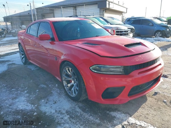 2021 Dodge Charger SRT Hellcat Widebody with VIN 2C3CDXL93MH592973, listed as a IAAI auction lot 41748976 with 24,884 mi miles. Bid and sale history available at carsss.com. Image 1.