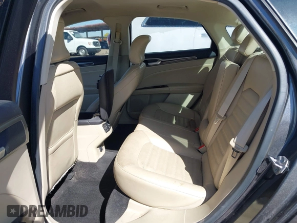 2015 Ford Fusion SE with VIN 3FA6P0HD2FR170310, listed as a IAAI auction lot 42123839 with 127,868 mi miles and . Bid and sale history available at DreamBid. Image 8.