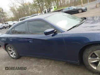 2015 Dodge Charger SXT with VIN 2C3CDXHG5FH878642, listed as a IAAI auction lot 42035569 with 228,000 mi miles and . Bid and sale history available at DreamBid. Image 13.