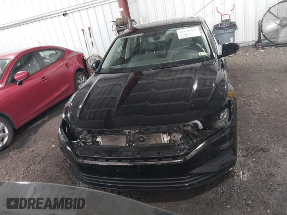 2021 Volkswagen Jetta S z VIN 3VWC57BU4MM009212, wystawiony jako IAAI lot #42136463 z przebiegiem 93 627 mil mil oraz . Historia ofert i sprzedaży dostępna na DreamBid. Obrazek 12.
