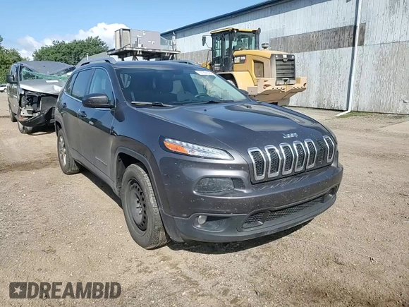 2015 Jeep Cherokee North with VIN 1C4PJMCSXFW582677, listed as a Copart auction lot 67999984 with 220,045 mi miles and Salvage Title. Bid and sale history available at carsss.com. Image 12.