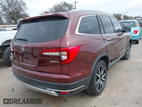 2019 Honda Pilot Touring 8-Passenger z VIN 5FNYF5H95KB009122, wystawiony jako IAAI lot #41573338 z przebiegiem 85 845 mil mil oraz . Historia ofert i sprzedaży dostępna na DreamBid. Obrazek 4.