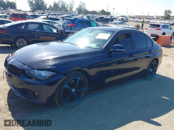 2015 BMW 3 Series 328i with VIN WBA3C1C50FK124300, listed as a IAAI auction lot 40112372 with 142,591 mi miles and . Bid and sale history available at carsss.com. Image 17.