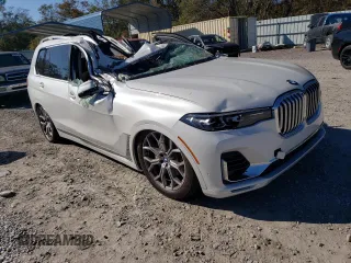 2021 BMW X7 xDrive40i with VIN 5UXCW2C04M9E66889, listed as a Copart auction lot 82988324 with 0 mi miles and Salvage Title. Bid and sale history available at carsss.com. Image 4.