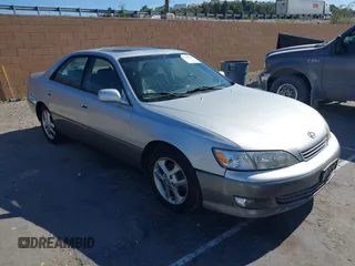 2001 Lexus ES 300 z VIN JT8BF28G510306504, wystawiony jako IAAI lot #41367634 z przebiegiem 132 952 mil mil oraz . Historia ofert i sprzedaży dostępna na DreamBid. Obrazek 1.