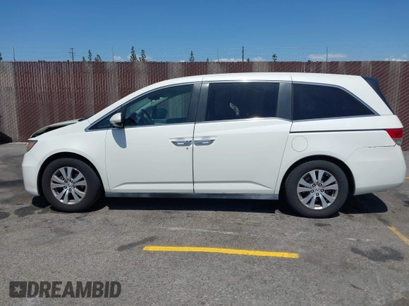 2015 Honda Odyssey EX-L with VIN 5FNRL5H67FB017554, listed as a IAAI auction lot 41974821 with 76,130 mi miles and . Bid and sale history available at carsss.com. Image 14.