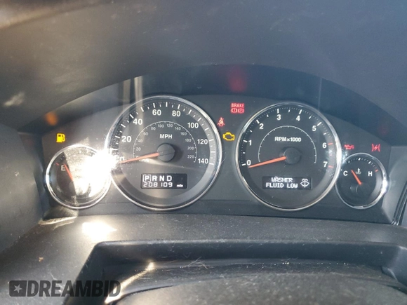 2010 Jeep Commander Sport with VIN 1J4RH4GK9AC113888, listed as a Copart auction lot 84553544 with 208,109 mi miles and Salvage title. Bid and sale history available at DreamBid. Image 9.