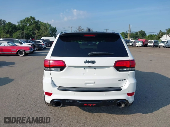 2016 Jeep Grand Cherokee SRT with VIN 1C4RJFDJ3GC503878, listed as a IAAI auction lot 42830257 with 82,661 mi miles and . Bid and sale history available at DreamBid. Image 16.