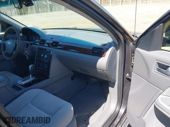2007 Ford Five Hundred SEL z VIN 1FAHP27197G132805, wystawiony jako IAAI lot #42140296 z przebiegiem 178 724 mil mil oraz . Historia ofert i sprzedaży dostępna na DreamBid. Obrazek 5.