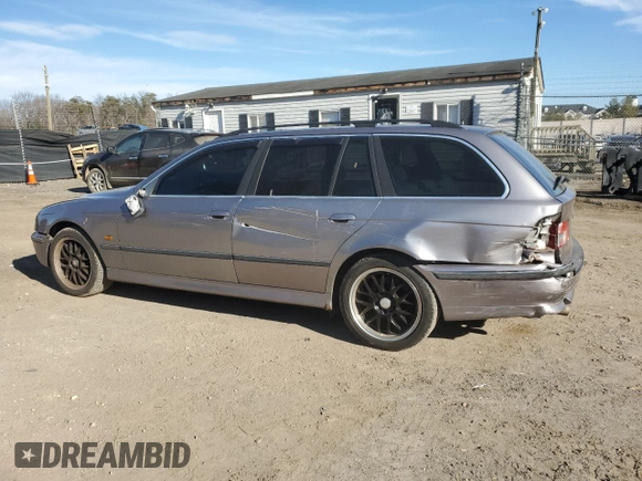 1999 BMW 5 Series 528iAt with VIN WBADP6334XBV60122, listed as a Copart auction lot 44493325 with 218,746 mi miles and Salvage Title. Bid and sale history available at carsss.com. Image 2.