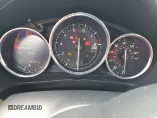 2020 Mazda MX-5 Miata Grand Touring z VIN JM1NDAM70L0414102, wystawiony jako Copart lot #55261575 z przebiegiem 70 157 mil mil oraz Szkoda całkowita • Salvage title. Historia ofert i sprzedaży dostępna na DreamBid. Obrazek 9.