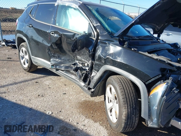 2019 Jeep Compass Latitude with VIN 3C4NJCBB1KT851846, listed as a IAAI auction lot 41219621 with 56,626 mi miles and . Bid and sale history available at DreamBid. Image 18.