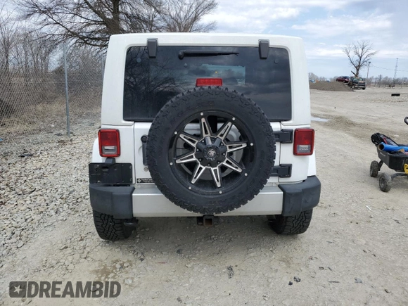 2012 Jeep Wrangler Arctic with VIN 1C4AJWBG1CL154184, listed as a Copart auction lot 50865135 with 152,767 mi miles and Clean title. Bid and sale history available at DreamBid. Image 6.