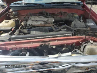 1994 Toyota T100 z VIN JT4VD20A1R0013626, wystawiony jako Copart lot #55592885 z przebiegiem 174 663 mil mil oraz Szkody całkowita. Historia ofert i sprzedaży dostępna na DreamBid. Obrazek 11.