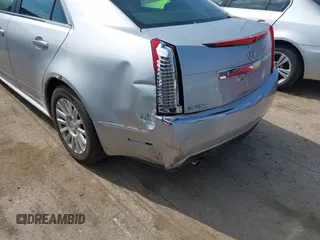 2011 Cadillac CTS Sedan Luxury with VIN 1G6DG5EY5B0165976, listed as a IAAI auction lot 42088157 with 151,004 mi miles. Bid and sale history available at carsss.com. Image 6.