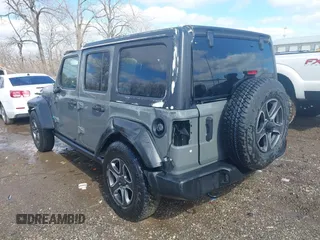2020 Jeep Wrangler Unlimited Sport Altitude with VIN 1C4HJXDG2LW335228, listed as a IAAI auction lot 41711295 with 43,451 mi miles and . Bid and sale history available at DreamBid. Image 3.
