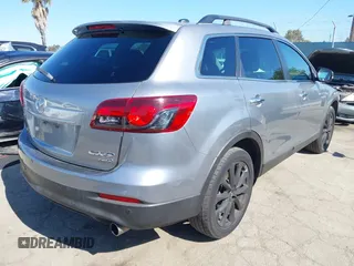 2014 Mazda CX-9 Grand Touring z VIN JM3TB3DV9E0437380, wystawiony jako IAAI lot #42298066 z przebiegiem 169 644 mil mil oraz . Historia ofert i sprzedaży dostępna na DreamBid. Obrazek 4.